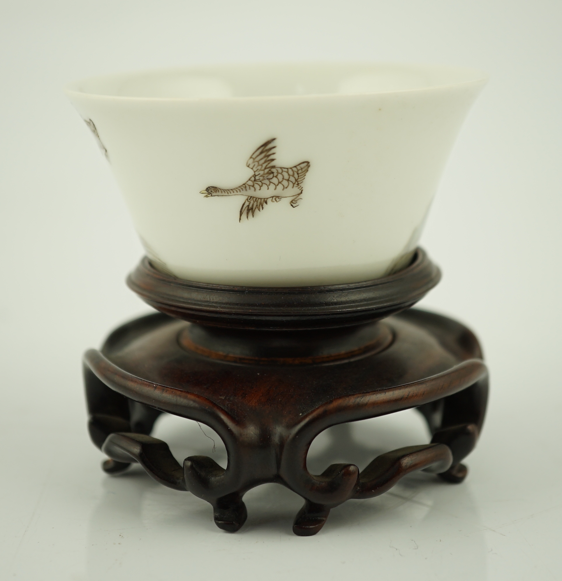 A Chinese enamelled porcelain 'leaping carp' cup, Daoguang mark and possibly of the period